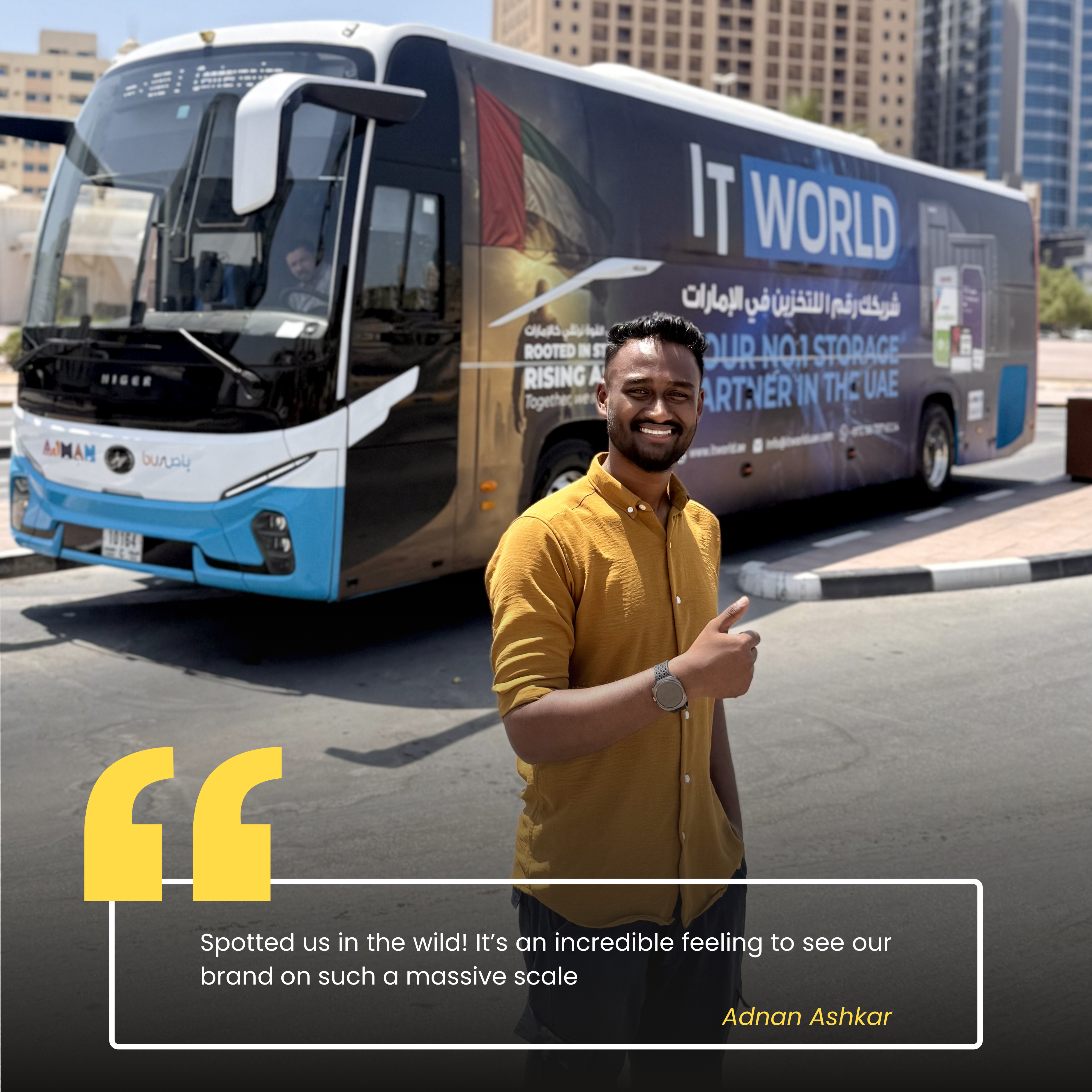 Adnan — IT World Trading team member, photographed beside the RTA campaign bus